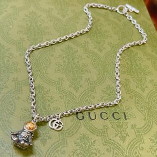 Retro astronaut necklace  27usd 